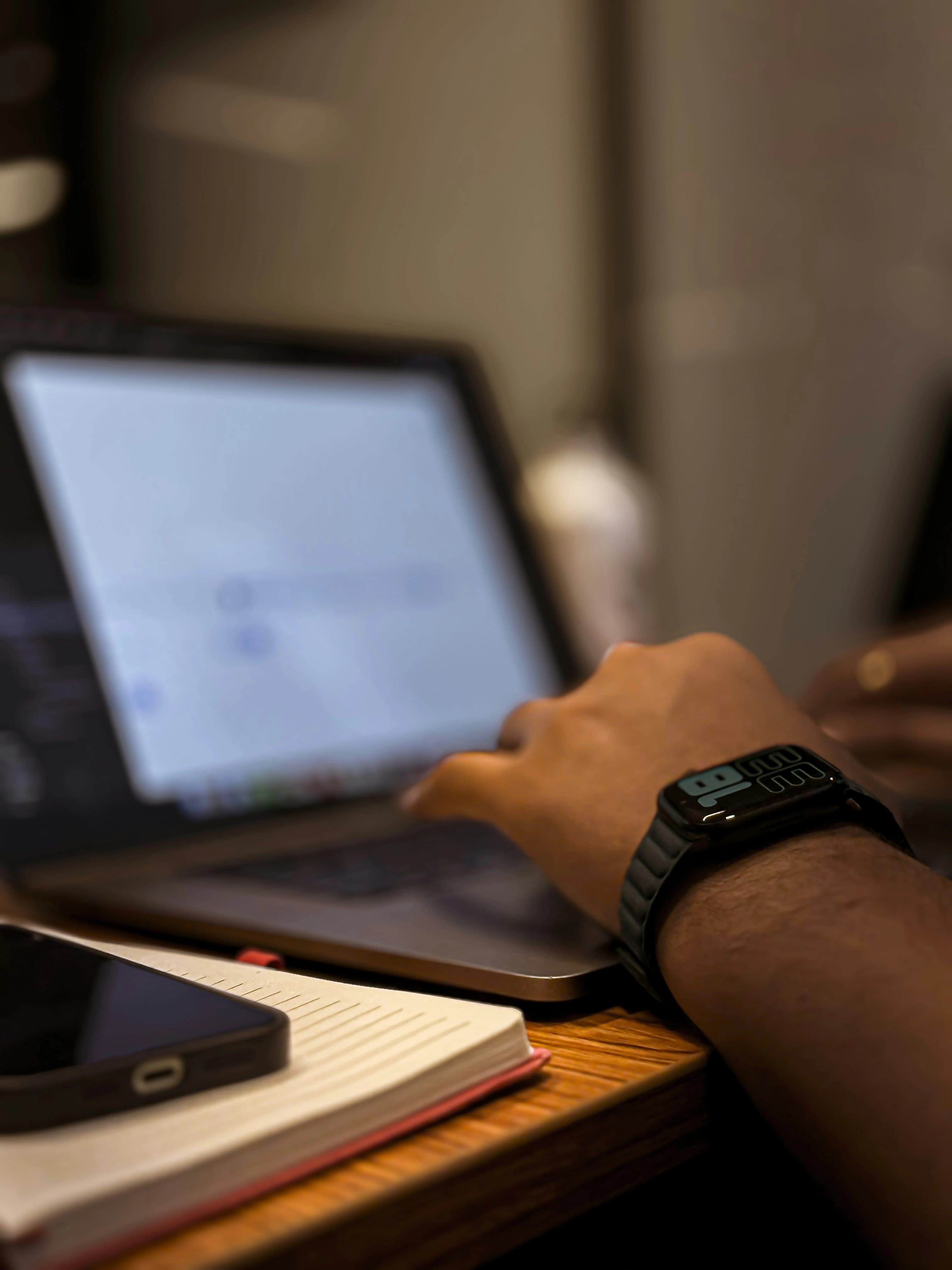 Hands at a laptop building a website and app in Pretoria - Matjila and Phiri Projects
